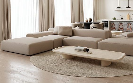 Sala de estar com móveis e mesa de centro com linhas retas